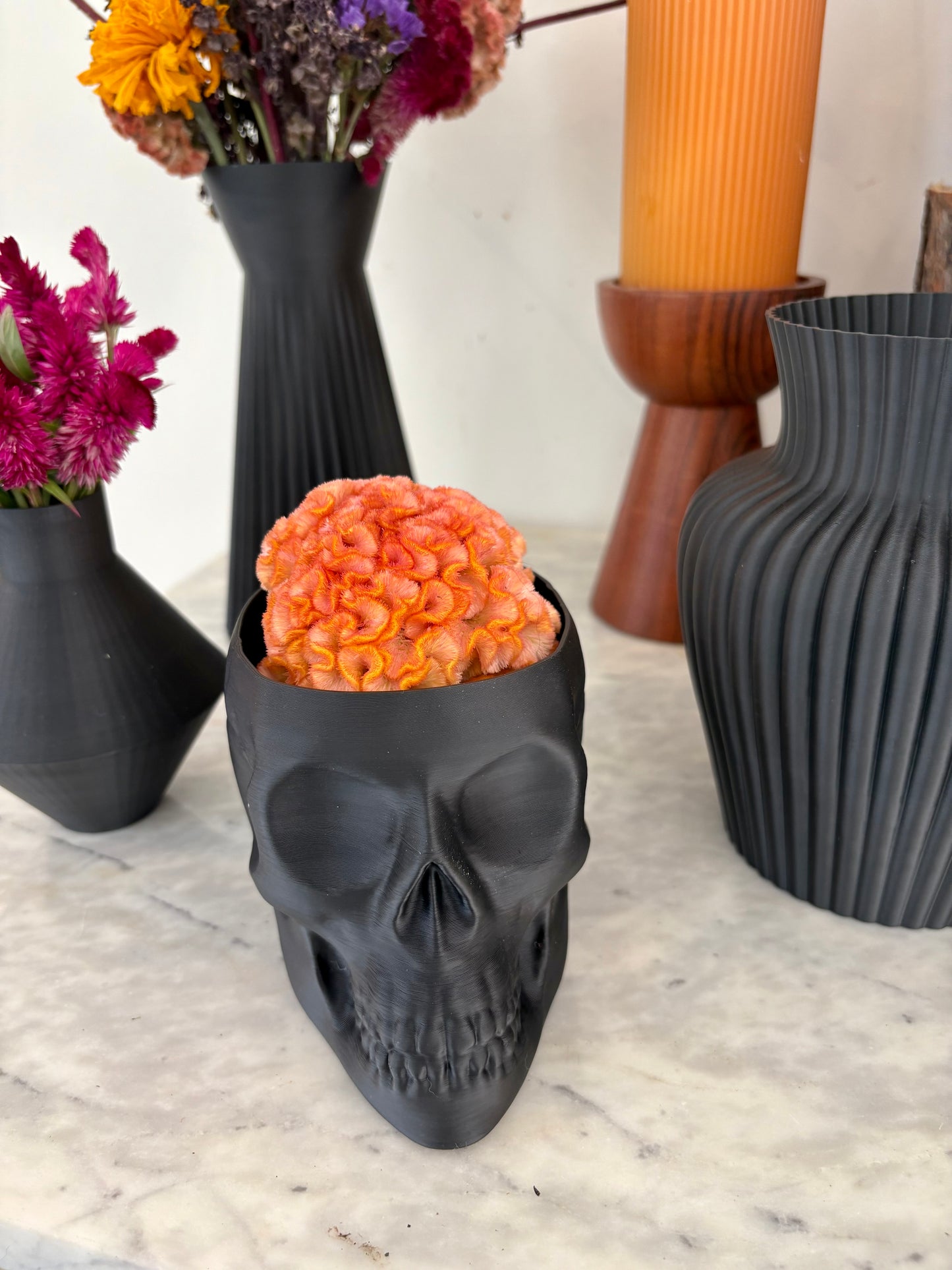 Skull Vase With Dried Flowers