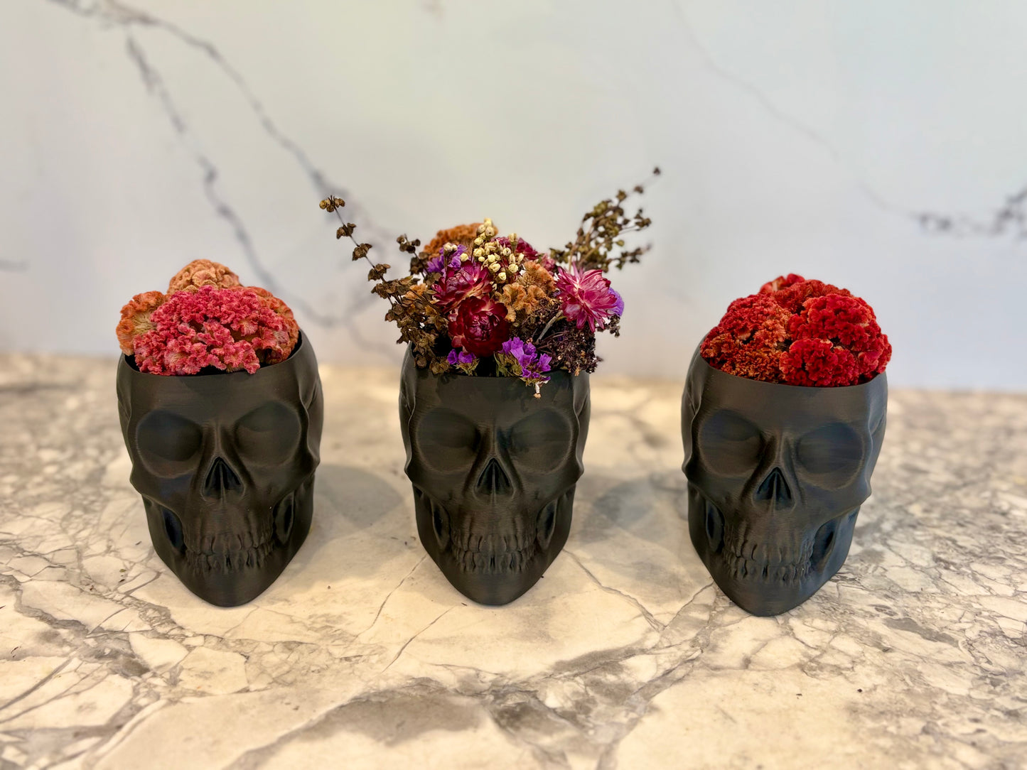 Skull Vase With Dried Flowers