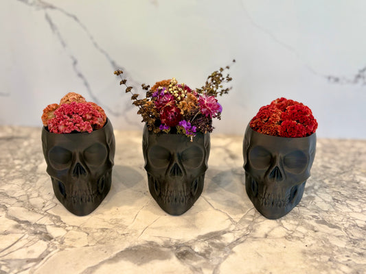 Skull Vase With Dried Flowers